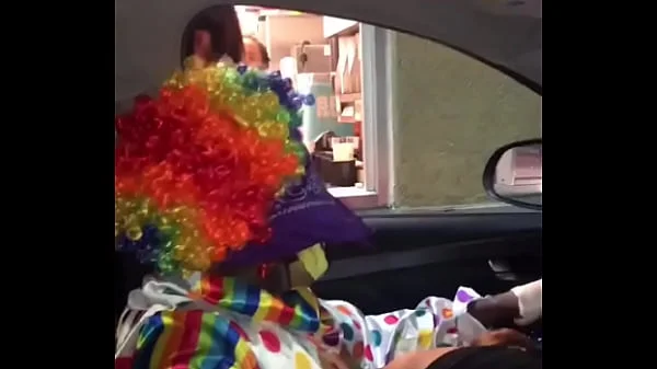 Clown gets dick sucked while ordering food