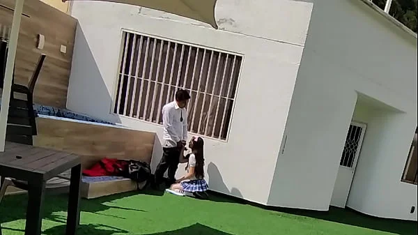 Young schoolboys have sex on the school terrace and are caught on a security camera.