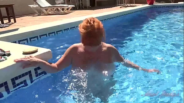 AuntJudys - Busty Mature Redhead Melanie goes for a swim