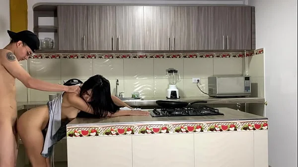 Passionate sex in the kitchen and a lot of cum at the end