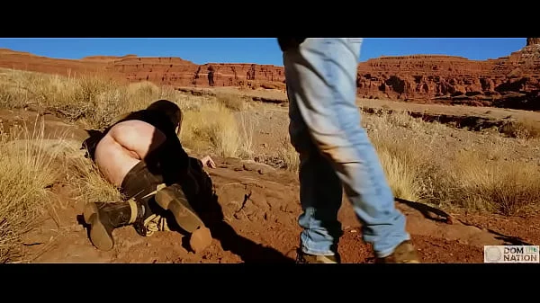 Big-ass blonde gets her asshole whipped, then gets rough anal sex in dirt and piss -- a real BDSM session outdoors in the Western USA with Rebel Rhyder