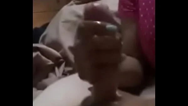 step mother makes a handjob to her before going to s.